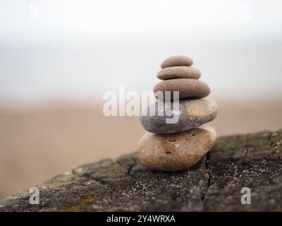 Abstract stack of pebbles, Suffolk, UK Stock Photo