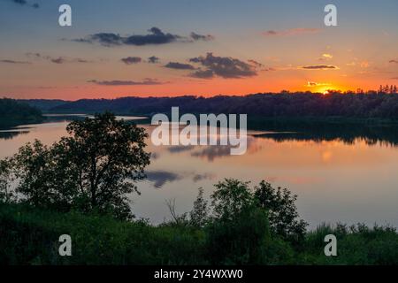 A Colorful sunset over Lake Minnewasta, Morden, Manitoba, Canada. Stock Photo