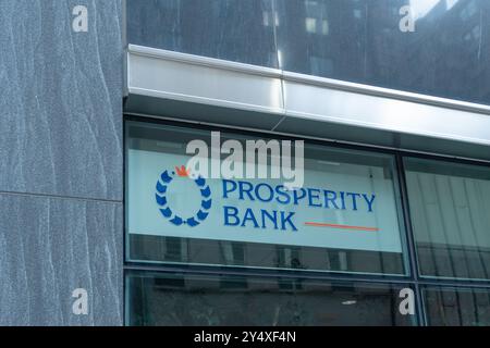 Houston, Texas, USA - April 14, 2024: Closeup of Prosperity Bank logo and sign at a branch in Houston, Texas, USA Stock Photo