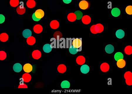 Abstract Image Of Blurry Christmas Lights On Black Background Stock Photo