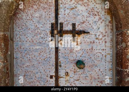 Old rusty iron door, Santorini, Greece Stock Photo
