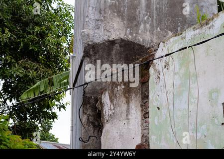 Wall fragment with scratches and cracks Stock Photo