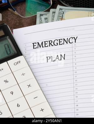Conceptual emergency plan symbol. Copy space. Emergency plan words written in a notebook in a ruler on a blank sheet Stock Photo
