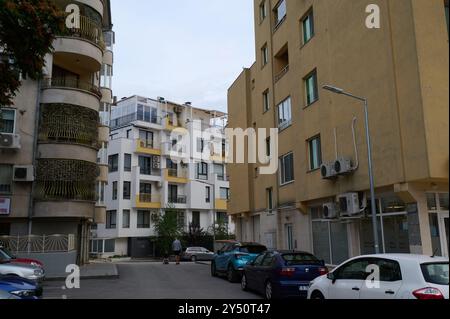 Modern residential architecture in an urban setting with distinct styles and colors showcasing the charm of city living Stock Photo