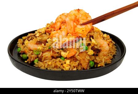 Chinese special egg fried rice meal with prawns and Char Sui pork meat Stock Photo