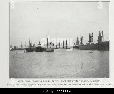 BUTE COAL-LOADING DOCKS, WITH Lewis-Hunter CRANES, CARDIFF. Twenty-two ships, aggregating 121,000 tons, were in the harbour when the view was taken. from the Article THE LOADING AND CARRIAGE OF SEA-BORNE COAL. By F. Seaton Snowdon  from The Engineering Magazine Devoted to Industrial Progress Volume XX 1900 - 1901  The Engineering Magazine Co Stock Photo