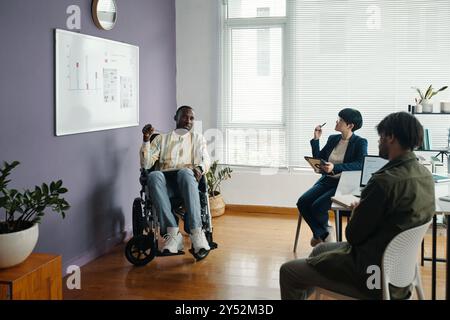 Business Colleagues Having Meeting In Office Stock Photo