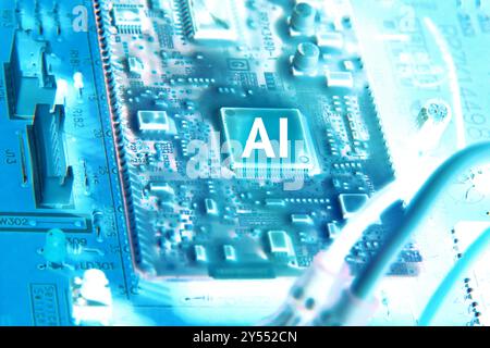 Macro focus to a "AI" motherboard, intelligence artificial concept. Stock Photo