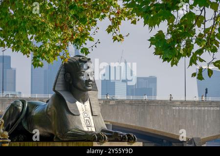 London, UK. One of two Egyptian-style bronze sphynxes (designed by George John Vulliamy) flanking Cleopatra's Needle on the Victoria Embankment. Moder Stock Photo