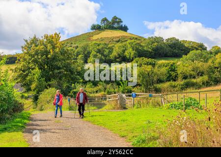 Walkers returning to Symondsbury village after climbing Colmer's Hill, nr Bridport, Dorset, England, UK Stock Photo