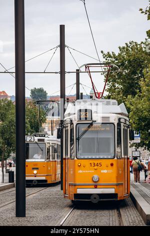 Budapest, Hungary - August 10, 2024: Traditional yellow tram in the center of Budapest Stock Photo