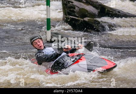 Duncan Edwards competes in Premier Canoe Slalom on rapids at River Tay at  Grandtully, Perthshire, Scotland, UK Stock Photo