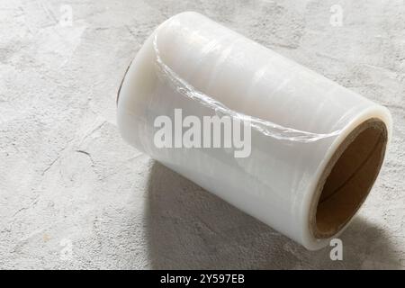 Polyethylene roll for packing, on a cement surface Stock Photo