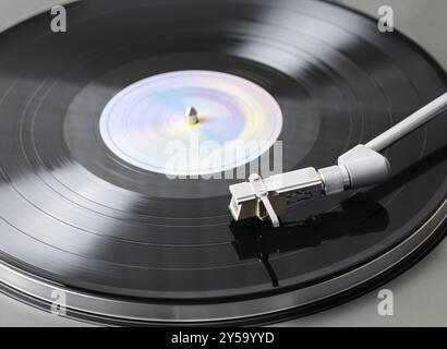 Vinyl Record Playing on a Record Player Stock Photo