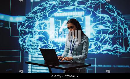 Speaker talking in online webinar, exploring ways AI can positively enhance companies workforce. Presenter promoting artificial intelligence solutions during internet presentation, camera B Stock Photo
