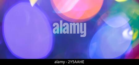 Vibrant Multicolored Bokeh Lights with Large Blurred Circles, Abstract Festive Background Stock Photo