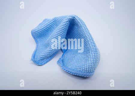 A soft blue microfiber cloth for cleaning the camera because it doesn't cause scratches Stock Photo