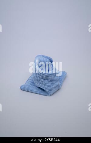 A soft blue microfiber cloth for cleaning the camera because it doesn't cause scratches Stock Photo