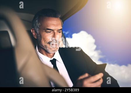 Man, agent and flight with phone in helicopter for travel, private investigation or research. Mature, male person or detective with technology for Stock Photo