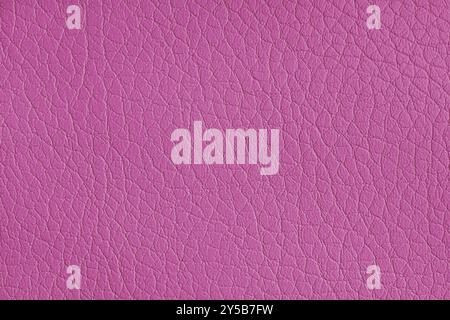 Texture of genuine leather or artificial synthetic leatherette pink color. Skin structure close up, macro, Background, wallpaper, backdrop with copy s Stock Photo