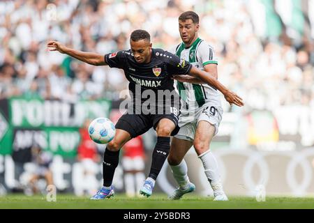 firo : 14.09.2024, Football, Football, 1. League, 1. Bundesliga, Borussia Monchengladbach - VfB Stuttgart Atakan Karazor (VfB Stuttgart) in duels with Joe Scally (Vfl Borussia Monchengladbach) Stock Photo