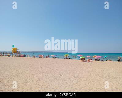 Palma de Mallorca, Spain; august 13 2024: General view of the beach of Palma de Mallorca with tourists on a sunny summer day Stock Photo