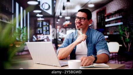 Analyst Businessman Thinking In Coffee Shop While Using Corporate Laptop Stock Photo