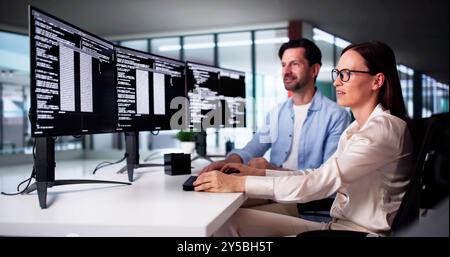 Web Developer Coding On Computer To Develop Code Stock Photo