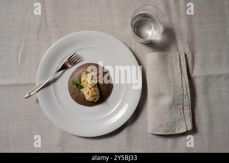 Baccala alla Vicentina with Black Polenta Nera Top View of Vicenza Style Stockfish Stock Photo