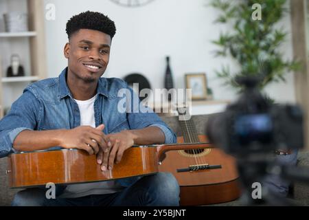 young guitar player recording video for his blog Stock Photo