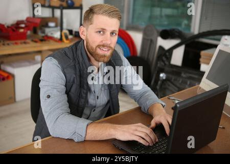 freelance developer smiling at camera Stock Photo