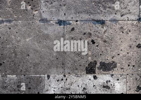 detail of wall of house from natural black tuff stone blocks in Gyumri city, Armenia Stock Photo
