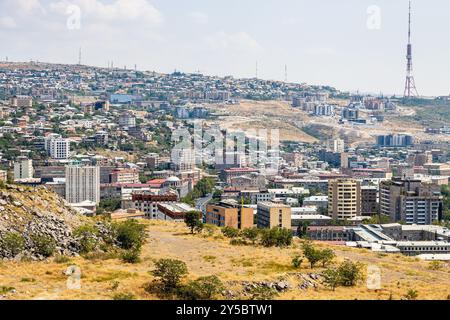 above view of Nork-Marash District and TV Tower in Yerevan city from Monument to 50th Anniversary on sunny summer day Stock Photo