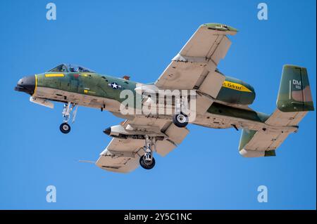 U.S. Air Force Maj. Lindsay “MAD” Johnson, A-10C Thunderbolt II Demonstration Team commander and pilot, signals to the audience from her A-10 aircraft Stock Photo