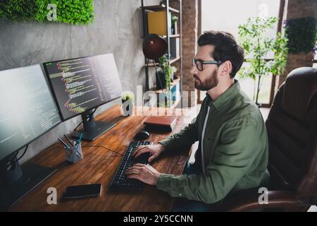 Photo of intelligent man hardware expert wear shirt work with operating system server pc cyber space indoors Stock Photo