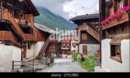 Most beautiful Swiss villages - pretty Griementz with traditional wooden houses and floral streets. popular tourist attraction in Valais Canton of Swi Stock Photo