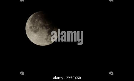 Partial eclipse of the supermoon on September 18 2024 Stock Photo