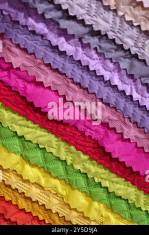 Samples of multi-coloured fabrics, abstract textile industry background Stock Photo