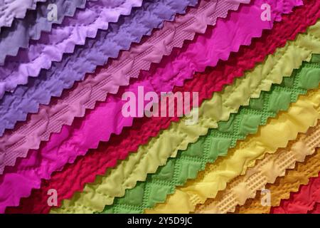 Samples of multi-coloured fabrics, abstract textile industry background Stock Photo