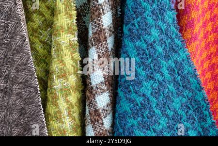 Samples of multi-coloured fabrics, abstract textile industry background Stock Photo