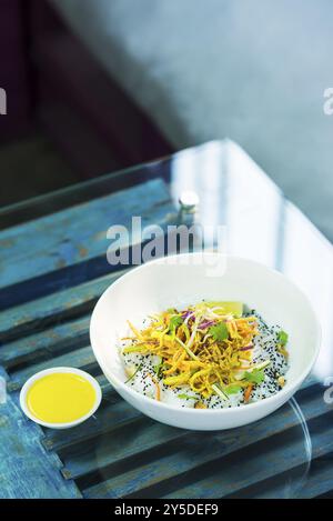 Asian spicy curry vegetable cold rice noodle salad Stock Photo