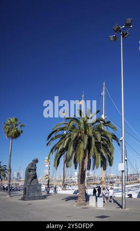 Urban marina pedestrian promenade in port vell area of barcelona spain Stock Photo