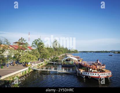 View of river boat tourist restaurants in kampot town cambodia Stock Photo