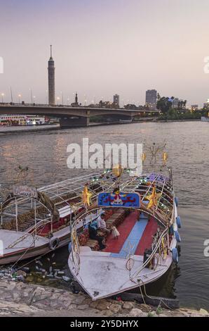 Boats on nile riverside cairo egypt at night Stock Photo