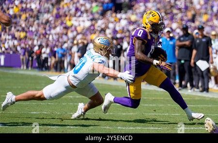 UCLA linebacker Kain Medrano runs a drill at the NFL football scouting ...