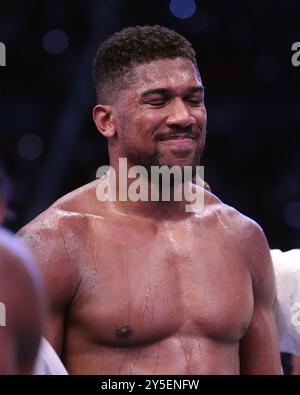 Anthony Joshua reacts to defeat by Daniel Dubois following the IBF World Heavy weight bout at Wembley Stadium, London. Picture date: Saturday September 21, 2024. Stock Photo