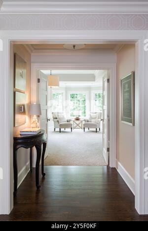 Entrance to master bedroom with double doors and small table and lamp Stock Photo