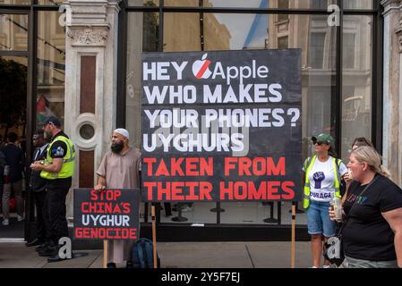 London, England, UK. 22nd Sep, 2024. Congolese, Palestinian and Uyghur demonstrators gathered by the Apple Store on the Regent Street in London. Protesters demand from the Apple to cut the ties with China because of the Uyghurs work as forced labour to make iPhones at the work camps. Also, demand from the Apple to stop aiding Israel because of the war and stop child labour and exploitation at the cobalt mines in Democratic Republic of Congo. (Credit Image: © Krisztian Elek/ZUMA Press Wire) EDITORIAL USAGE ONLY! Not for Commercial USAGE! Stock Photo