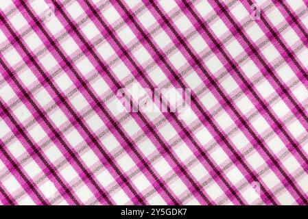 Checkered red fabric. Textile. Checkered fabric background with red and white cells Stock Photo