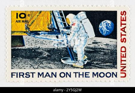 'First Man on the Moon' 10 cents U.S. Airmail Stamp issued on 9 September 1969, commemorating the Apollo 11 mission. The stamp features Neil Armstrong stepping onto the lunar surface and was designed by Paul Calle (1928-2010). Stock Photo